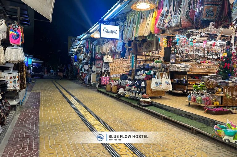 Street near Blue Flow Hostel Koh Phi Phi with local shops