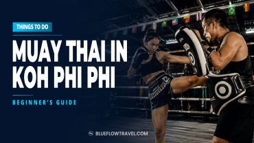 Muay Thai training session in Koh Phi Phi with a student practising kicks with a trainer